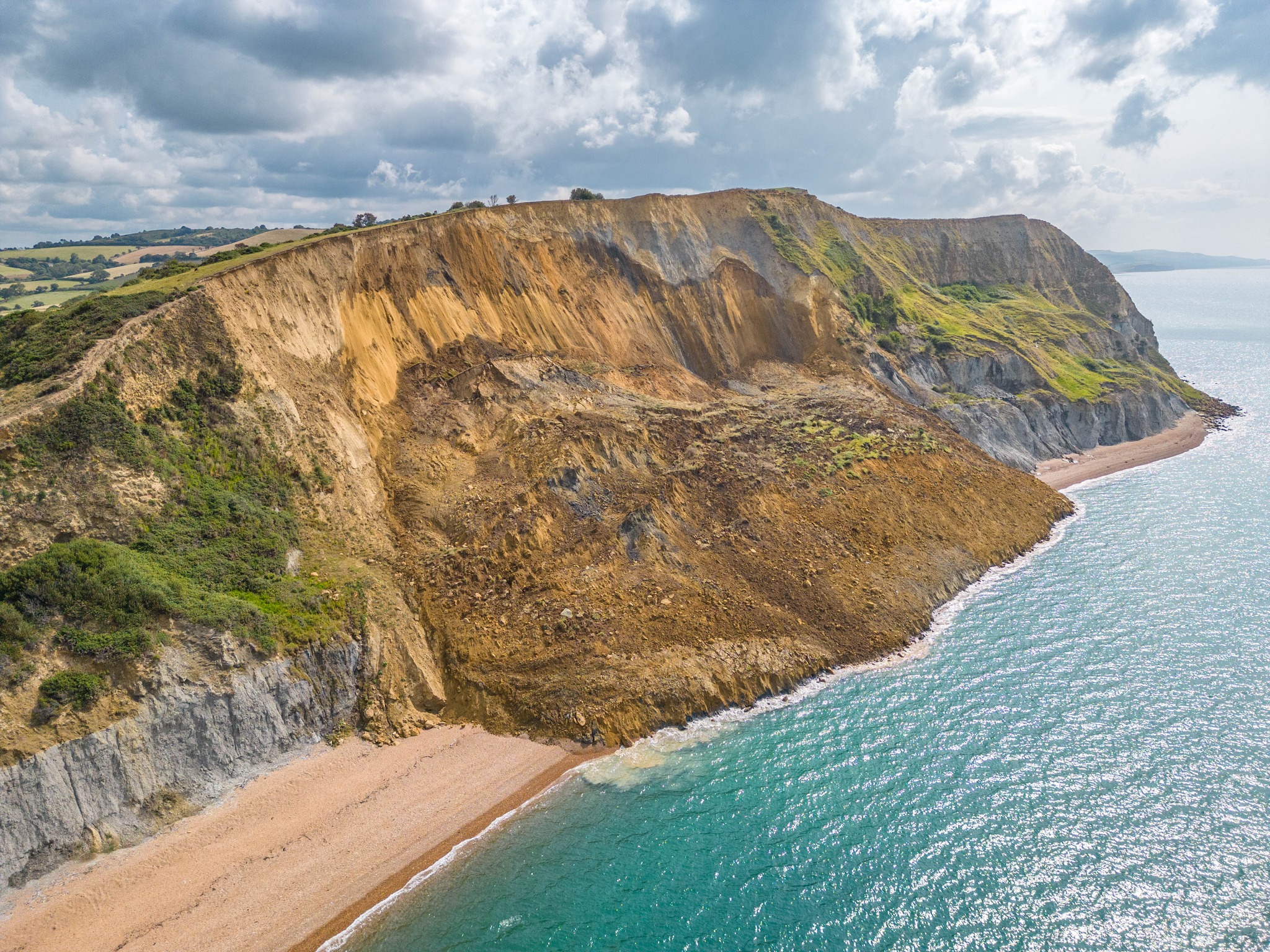 Warning To Keep Away From Large Cliff Fall At Seatown